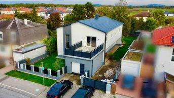 Expose Traumhaftes Ein-Zweifamilienhaus in Leopoldsdorf - 749m² Fläche, viel Komfort!