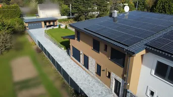 Expose Luxuriöses Einfamilienhaus mit nachhaltiger und moderner Architektur in 2410 Hainburg an der Donau.