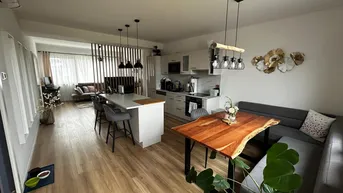 Expose 2-Zimmer Dachgeschosswohnung mit Terrasse und Parkplätzen