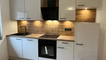 Expose Moderne 2-Zimmer Neubau Wohnung mit Garten