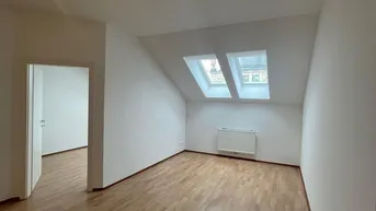 Expose Schöne Dachgeschosswohnung in Top-Lage - 2 Zimmer, 53m²!