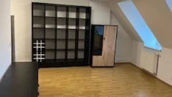 Expose Stilvolles Wohnen am Fuße des Schlossbergs - Moderne 2-Zimmer Wohnung in top Lage mit Einbauküche