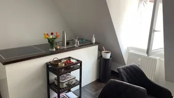Expose Charmante Dachgeschosswohnung in Grazer Innenstadt nähe Kunsthaus – Ihr neues Zuhause wartet!