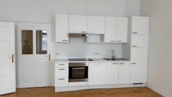 Expose Gemütliche, lichtdurchflutete 2-Zimmer-Wohnung: Schlafzimmer, Kochen/Essen/Wohnen, Balkonbereich auf Allgemeinfläche und Hofmitbenützung