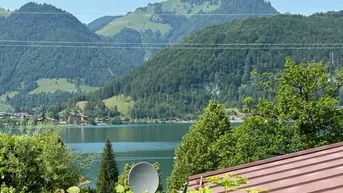 Expose See- und Bergblick am Walchsee (Tirol) - Wohnwagen mit festem Holzvorbau - Ferienhaus