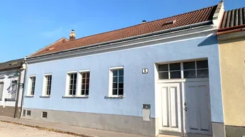 Expose Altbau-Charme mit Garten und Veranda: Reihenhausflair in ruhiger Ortskernlage