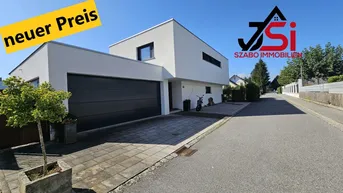 Expose Dieses neuwertige Einfamilienhaus mit beheizten Pool ist ein Blickfang.