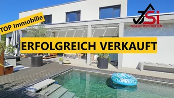 Expose Dieses neuwertige Einfamilienhaus mit beheizten Pool ist ein Blickfang.