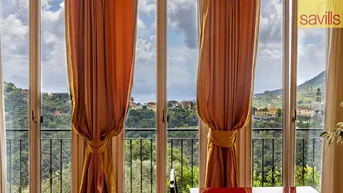 Expose Elegantes Apartment in einem historischen Gebäude mit Meerblick und privatem Garten.