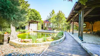 Expose **Exklusives Einfamilienhaus mit Pool, Garage, Gartenparadies &amp; hochwertiger Ausstattung nahe Wien**