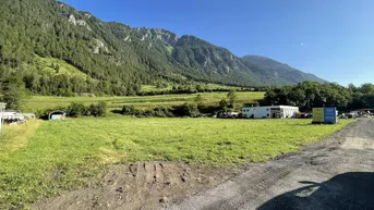 Expose Gewerbegrundstück im Dreiländereck – Beste Lage direkt an der B180 in Pfunds !Flexible Flächen ab 1000m²!