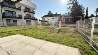Expose Erstbezug! 2-Zimmer Gartenwohnung inkl. 2 KFZ-Stellplätze!