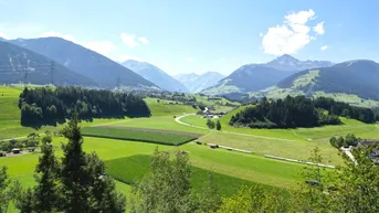 Expose Mitten im Grünen - Sonniges Grundstück im Mittelgebirge