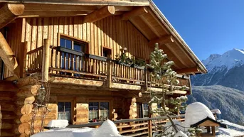 Expose Natur, Stille, Berge - Kanadisches Vollblockhaus mit Gästeappartements und Privatbereich