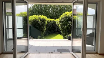 Expose Bergheim: Moderne 3-Zimmer-Gartenwohnung mit überdachter Terrasse