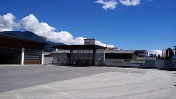 Expose Gewerbefläche mit Büro, Werkstatt, Waschhalle, LKW-Stellplätzen – Radfeld, Tirol