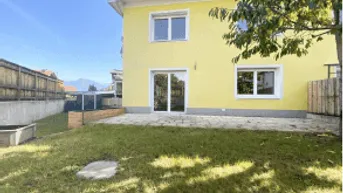 Expose Familienparadies in Götzens: Wunderschöne 4-Zimmer-Wohnung im Reihenhausstil mit Garten