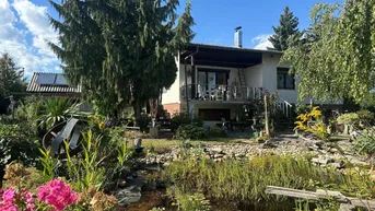 Expose Einfamilienhaus im Grünen mit Gästewohnung und traumhaften Garten
