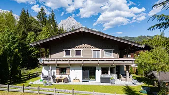 Expose „Sonnenverwöhntes Wohnen mit Bergblick – Ihr Rückzugsort am Waldrand“.