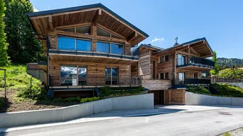 Expose Edle Chalets in „Ski-in &amp; Ski-out“-Lage mit imposanten Kaiserblick