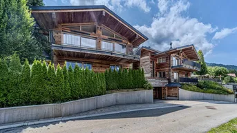 Expose Edle Chalets in „Ski-in &amp; Ski-out“-Lage mit imposanten Kaiserblick