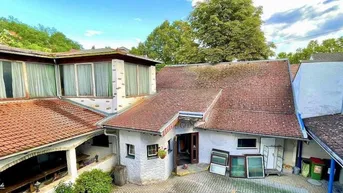 Expose Vielseitige Gewerbeimmobilie inklusive Wohnungen/Apartments mit Entwicklungspotenzial in zentraler Lage