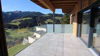 Expose Lichtdurchflutetes Dachterrassen-Apartment mit traumhaftem Alpenpanorama im Hochtal an den Kitzbüheler Alpen