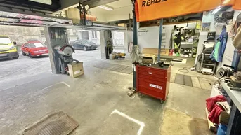 Expose Eigentumsgarage mit Montagegrube - Fahrradwerkstatt &amp; E-Ladestation