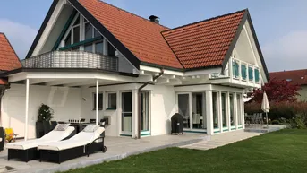 Expose Exklusives Architekten-Einfamilienhaus in Holzständerbauweise mit großem Garten - provisionsfrei