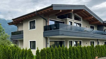 Expose Privatsphäre &amp; Panorama – großzügige Gartenwohnung mit zwei Terrassen in Ruhelage von Kössen