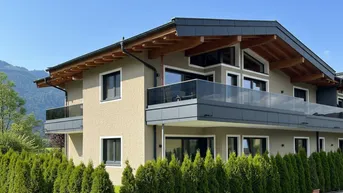 Expose Privatsphäre &amp; Panorama – großzügige Gartenwohnung mit zwei Terrassen in Ruhelage von Kössen