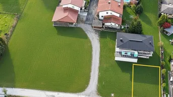 Expose Traumhaftes Grundstück am Walchsee – Bergblick inklusive!