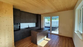Expose Exklusive 5-Zimmer-Wohnung in Vollholzbauweise mit 39 m² Terrasse und 2 Bädern