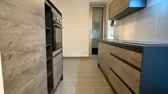 Expose Altbauflair &amp; Wohnkomfort - 2 Zimmer-Wohnung mit Loggia im Herzen Eisenstadts