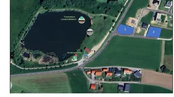 Expose Grundstücke mit direktem Blick auf den Landschaftsteich