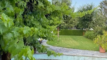 Expose Familienhaus mit viel Garage und Garten / Bauland 