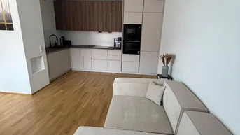 Expose Moderne 2-Zimmer-Dachgeschosswohnung mit 2 Garagenplätzen – 2104 Spillern