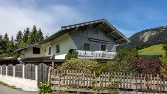 Expose Dachgeschoßwohnung mit Gartenanteil