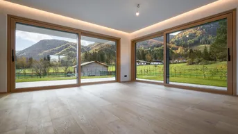 Expose Neubauwohnung mit Garten und Kamin