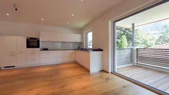 Expose Ihr Wohlfühl-Zuhause in Niederau – elegante Wohnung mit Designküche und Balkon mit Bergblick