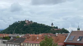 Expose Dachgeschosswohnung mit 4 Zimmern Terrasse und Tiefgarage