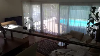 Expose Modernes 5-Zimmer Einfamilienhaus mit Pool und Garten
