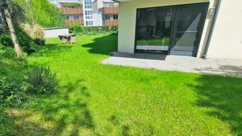 Expose Sonnendurchströmte 4-Zimmer Maisonette mit 231 m² Garten und 3 Parkplätzen