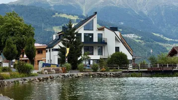 Expose 🏡 TOP 62 · 2-Zimmer-Erstbezug, 47 m² mit 5 m Raumhöhe &amp; Süd-West-Balkon – Ladis