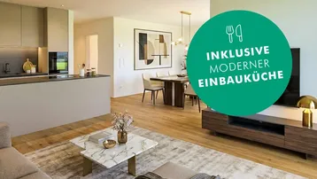 Moderner offener Wohn- und Essbereich mit integrierter Küche und stilvoller Einrichtung.