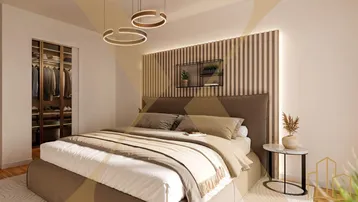 Modernes Schlafzimmer mit stilvollem Bett, integriertem Kleiderschrank und indirekter Beleuchtung.