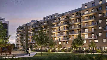 Moderne Wohnanlage mit zahlreichen Balkonen und einem begrünten Innenhof bei Dämmerung.