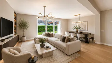 Heller, offener Wohn-Essbereich mit modernem Design, Holzboden und Zugang zum Garten.