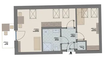 Grundriss einer Wohnung mit Wohnküche, Schlafzimmer, Bad und Balkon.