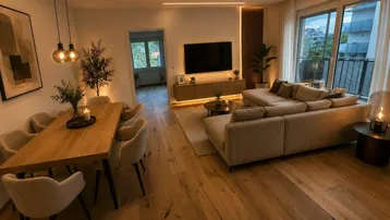 Moderner offener Wohn- und Essbereich mit Holzboden, stilvoller Beleuchtung und Zugang zum Balkon.